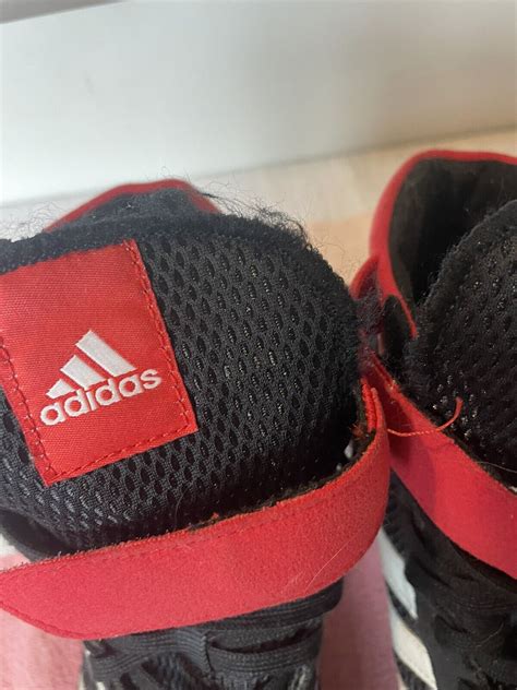 adidas grey and red shoes|black and red gym shoes.